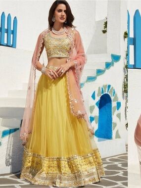 Elegant Yellow Embellished Lehenga Choli with Pink Dupatta